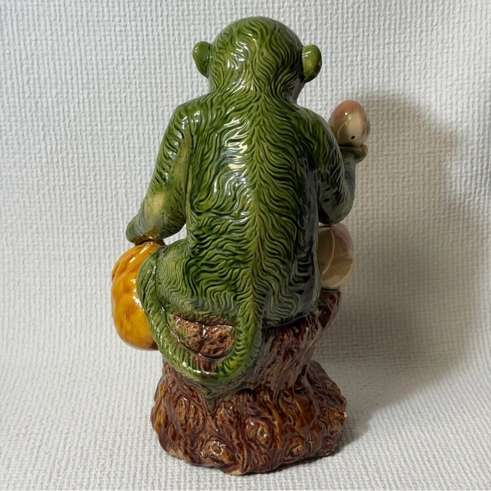 Antique Collectible Monkey Holds Fruits and Water bag.